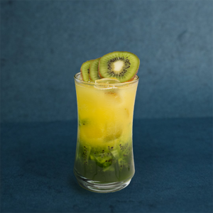 Green Horizon,a refreshing layered drink with kiwi and citrus notes, garnished with fresh kiwi slices.